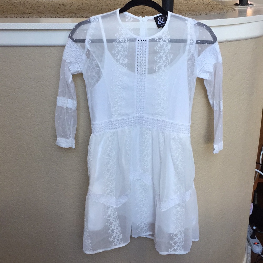 White Lacey tunic, size small. Brand new
